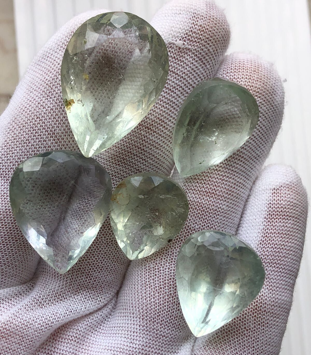 green gem crossword clue