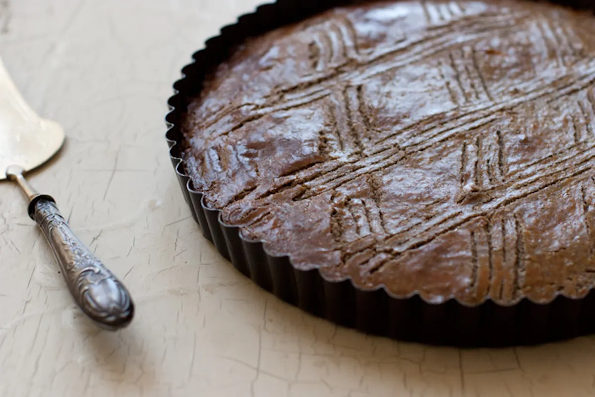 rum cake crossword clue