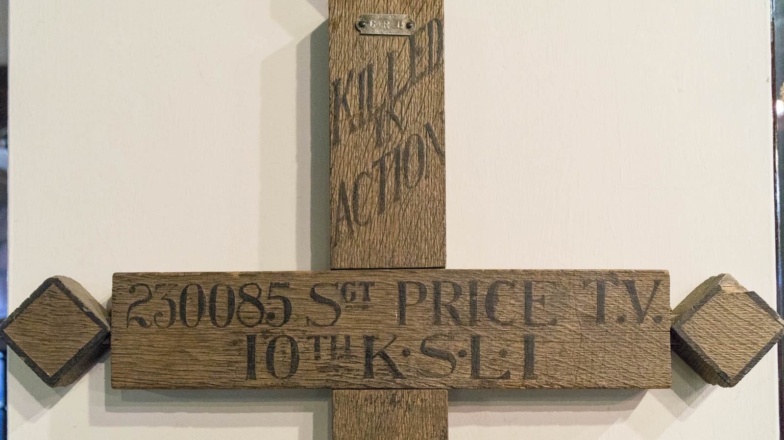 crucifix crossword clue